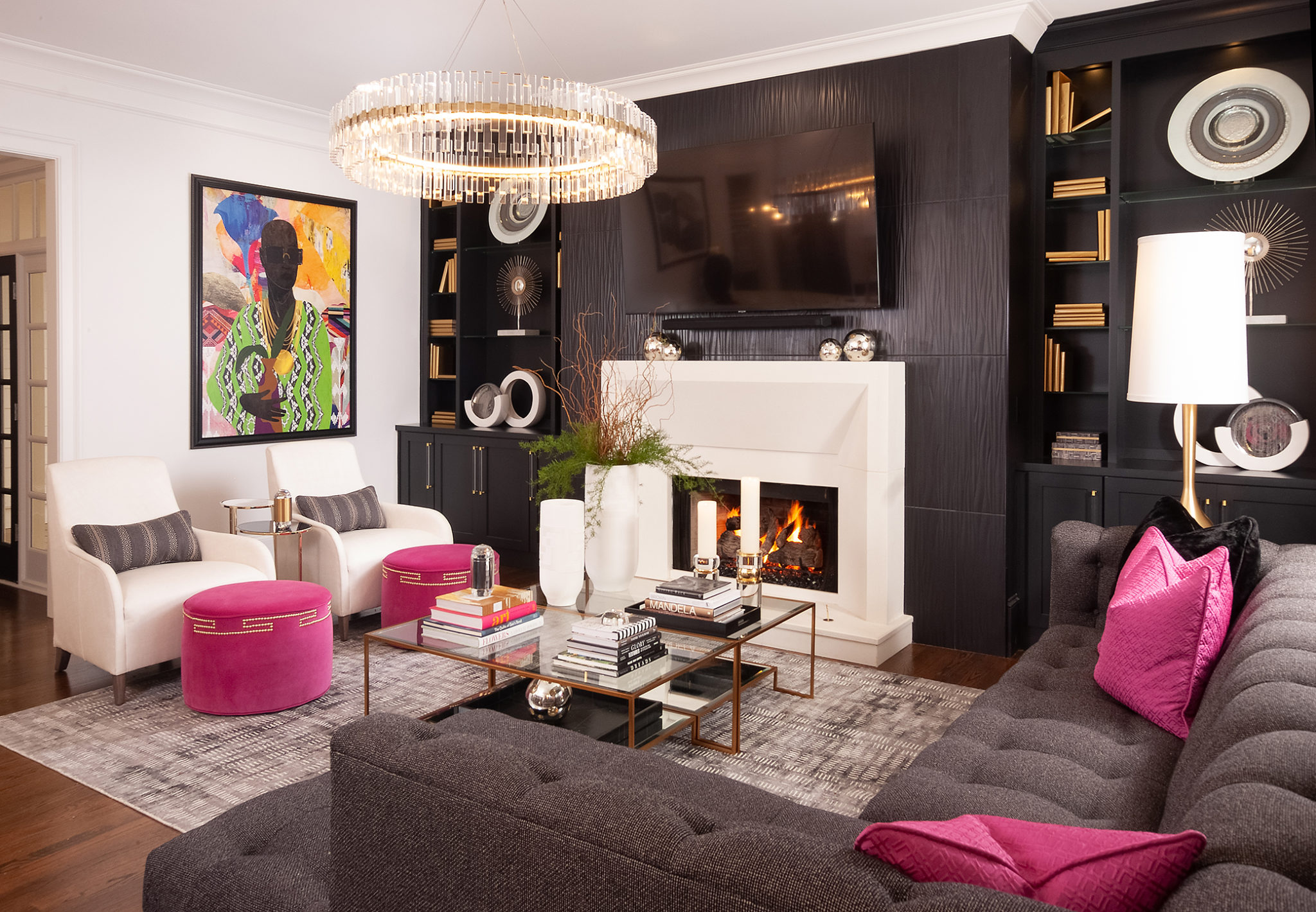 Living Room with Pink Pillows and Ottomans