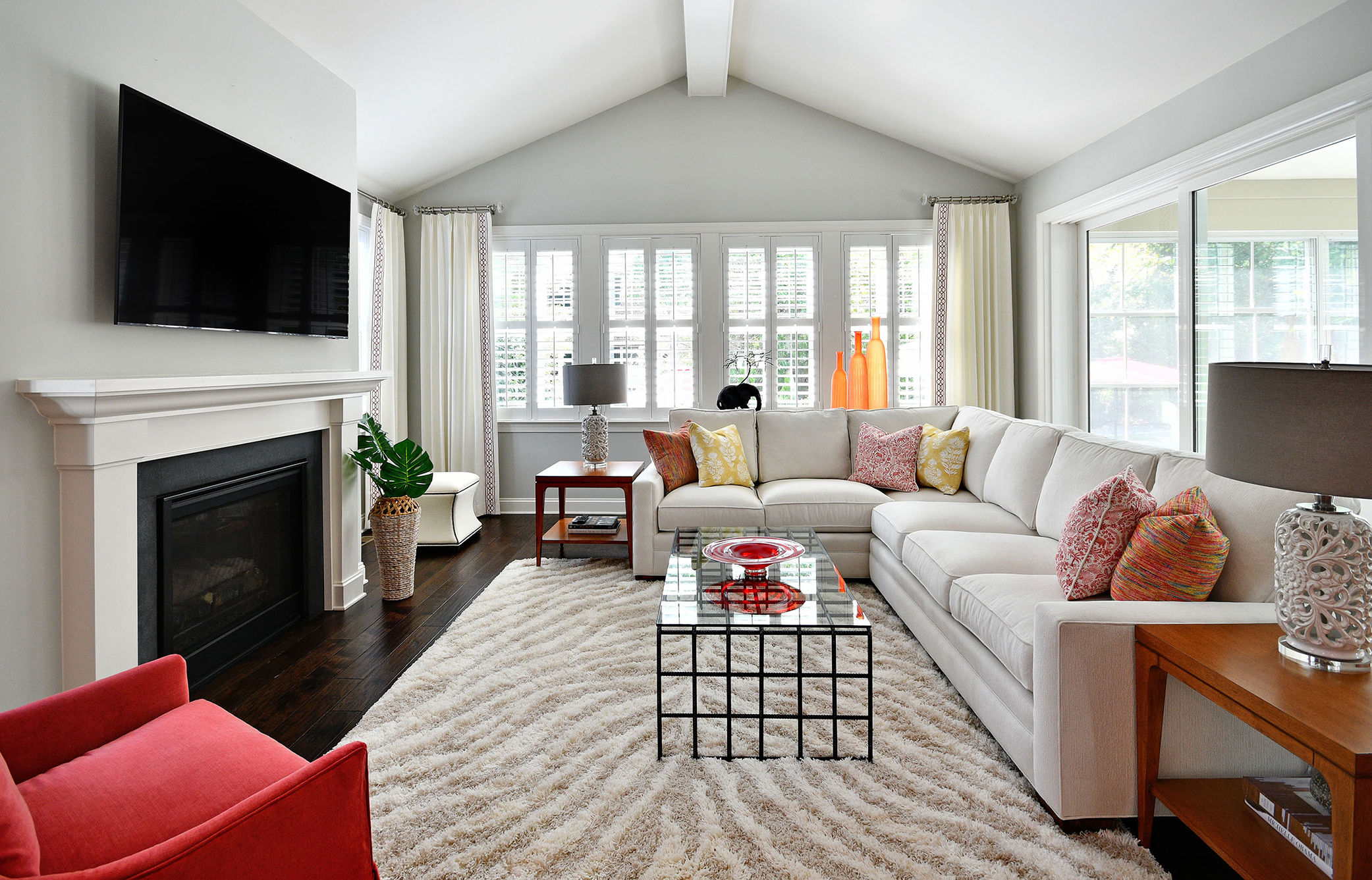 Warm living room with stone fireplace